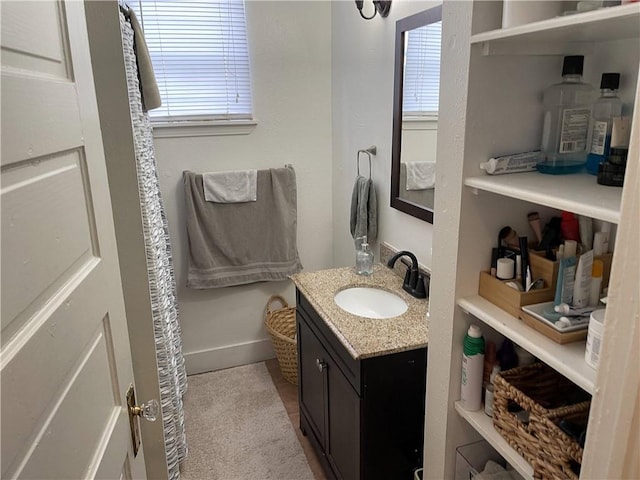 7935 Fig St, New Orleans, LA 70125 - bathroom with vanity and healthy amount of natural light