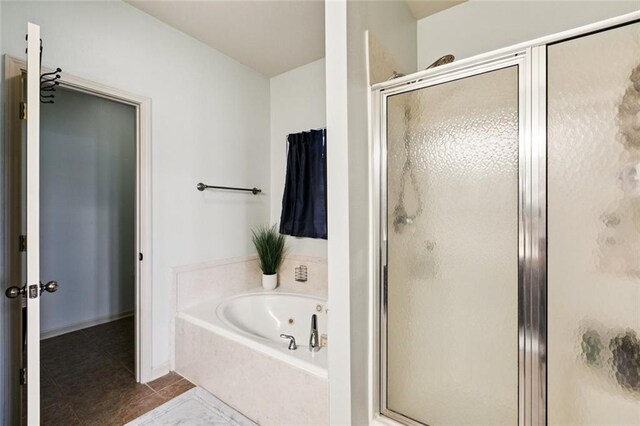 13795 Shady Hollow Dr, Denham Springs, LA 70726 - full bath featuring a stall shower, tile patterned flooring, and a bath