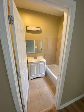 1317-1919 S Genois St, New Orleans, LA 70125 - full bath with vanity, a tub, and tile patterned flooring