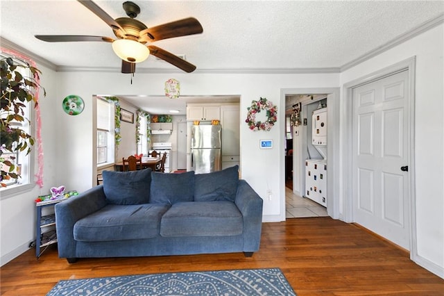 1500 Shirley Dr, New Orleans, LA 70114 - living area featuring ornamental molding, a ceiling fan, wood finished floors, and a textured ceiling