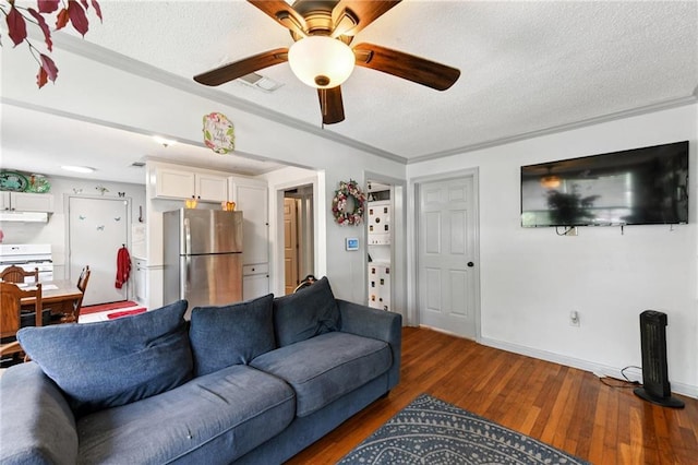 1500 Shirley Dr, New Orleans, LA 70114 - living area with wood finished floors, ceiling fan, a textured ceiling, and ornamental molding
