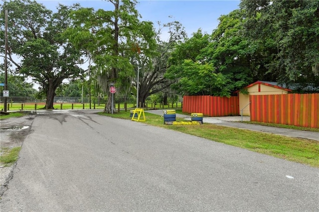 1500 Shirley Dr, New Orleans, LA 70114 - view of asphalt road with traffic signs