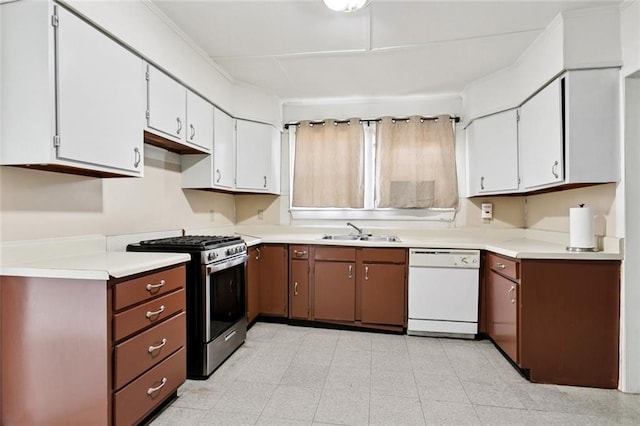 1117 Perry St, Gretna, LA 70053 - kitchen with stainless steel gas range, dishwasher, white cabinetry, and light countertops