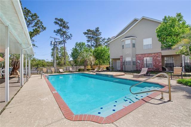 521 Spartan Dr Unit 10207, Slidell, LA 70458 - community pool featuring a patio
