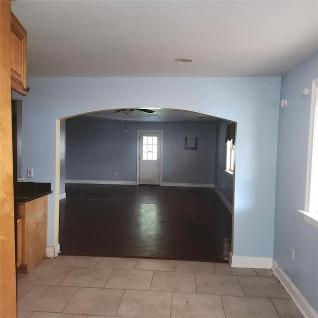 3020 Maureen Ln, Meraux, LA 70075 - spare room with arched walkways and light tile patterned floors
