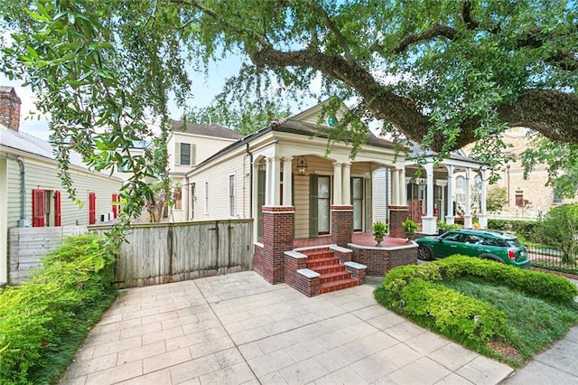 3354 Esplanade Ave, New Orleans, LA 70119 - view of front of home featuring covered porch