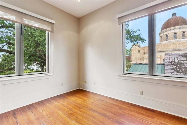 3354 Esplanade Ave, New Orleans, LA 70119 - spare room featuring wood finished floors