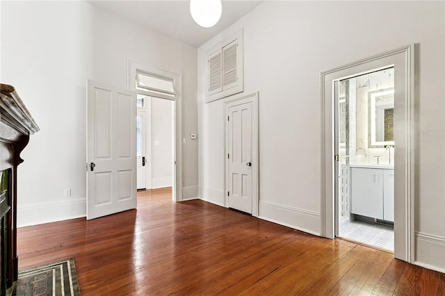 3354 Esplanade Ave, New Orleans, LA 70119 - foyer entrance with hardwood / wood-style flooring and baseboards