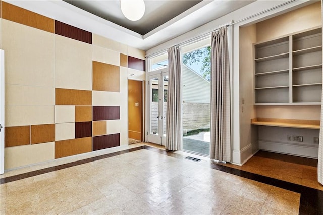 3354 Esplanade Ave, New Orleans, LA 70119 - spare room featuring inlaid floor details