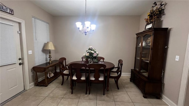 40145 Taylors Trl Unit 304, Slidell, LA 70461 - dining area featuring a chandelier and light tile patterned floors