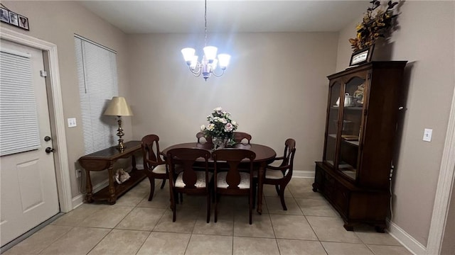 40145 Taylors Trl Unit 304, Slidell, LA 70461 - dining space with a chandelier and light tile patterned floors