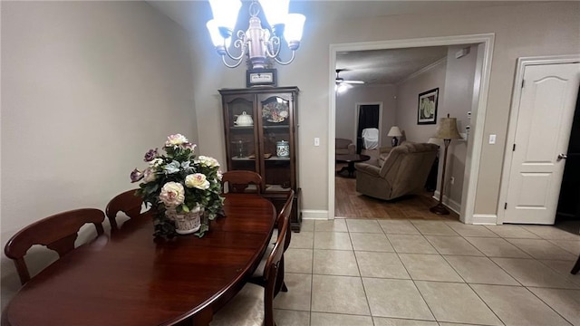 40145 Taylors Trl Unit 304, Slidell, LA 70461 - dining area with a chandelier, light tile patterned floors, and a ceiling fan