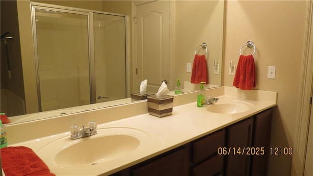 40145 Taylors Trl Unit 304, Slidell, LA 70461 - full bathroom featuring double vanity and a shower with shower door