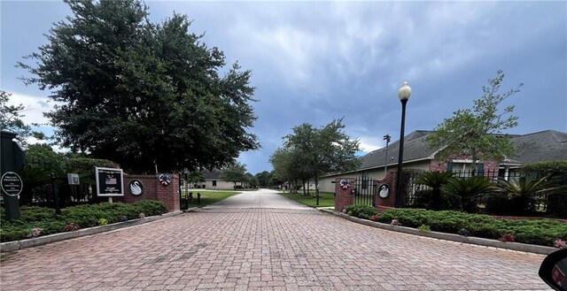 40145 Taylors Trl Unit 304, Slidell, LA 70461 - view of decorative road featuring curbs and street lights