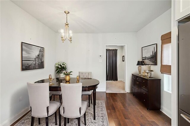 3606 N Miro St, New Orleans, LA 70117 - dining area featuring dark wood-type flooring and a chandelier