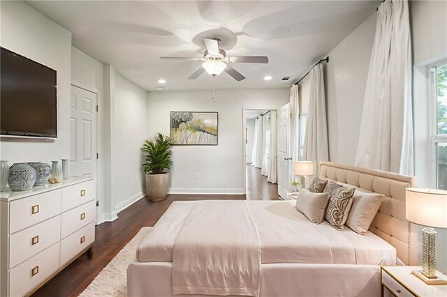 3606 N Miro St, New Orleans, LA 70117 - bedroom with dark wood-type flooring, recessed lighting, and ceiling fan