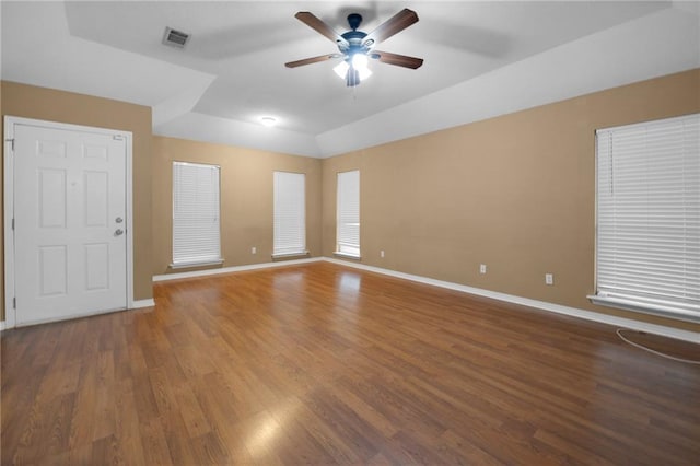 70405 F St, Covington, LA 70433 - empty room with a ceiling fan and wood finished floors