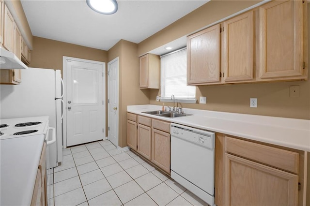 70405 F St, Covington, LA 70433 - kitchen featuring dishwasher, light brown cabinetry, and light countertops