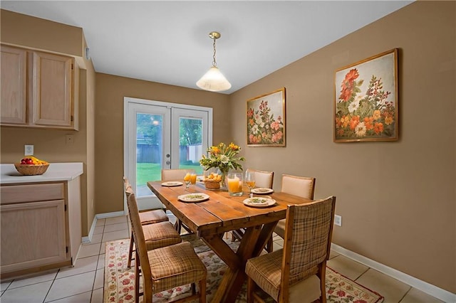 70405 F St, Covington, LA 70433 - dining area featuring french doors and light tile patterned flooring