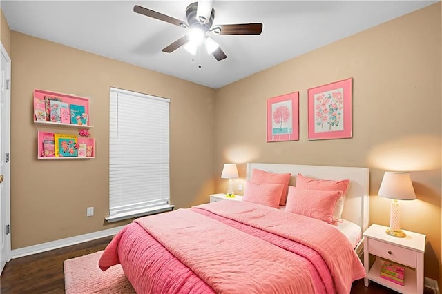 70405 F St, Covington, LA 70433 - bedroom with wood finished floors and a ceiling fan