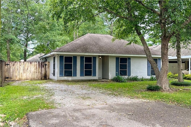 70405 F St, Covington, LA 70433 - view of front of property with roof with shingles