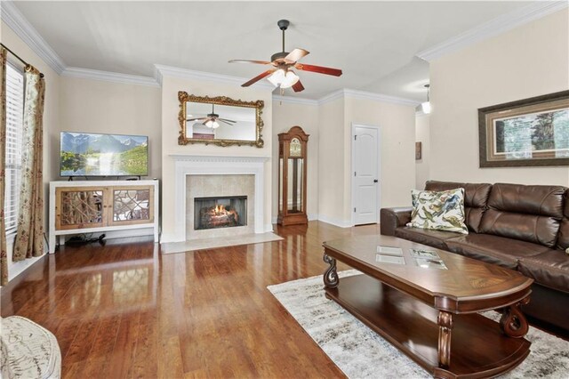 855 Woodsprings Ct, Covington, LA 70433 - living room with ceiling fan, wood finished floors, crown molding, and a premium fireplace