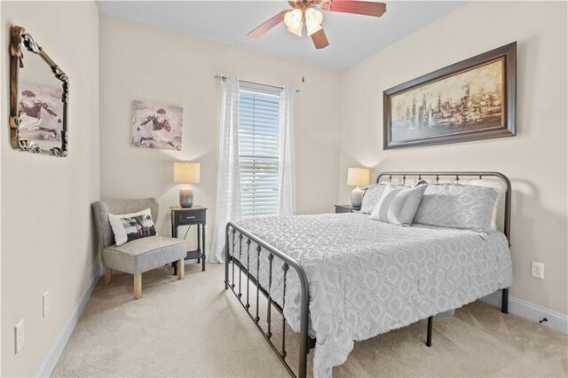 855 Woodsprings Ct, Covington, LA 70433 - bedroom with light carpet and a ceiling fan
