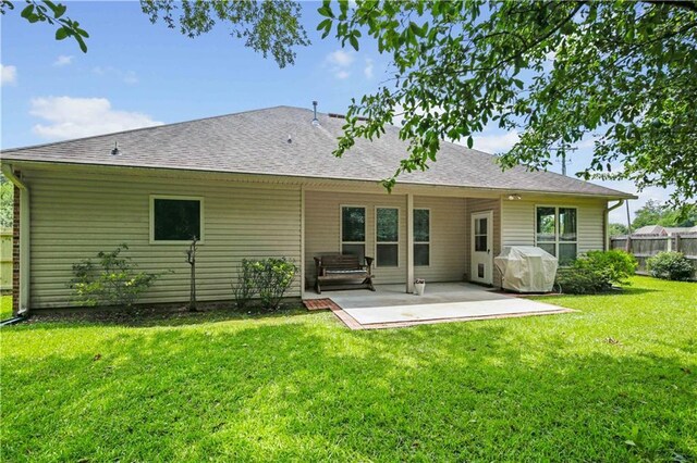 855 Woodsprings Ct, Covington, LA 70433 - back of house with a patio area and roof with shingles