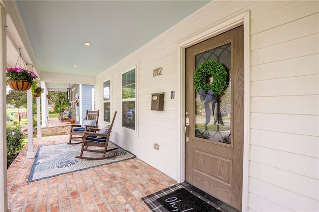 1112 Compromise St, Kenner, LA 70062 - doorway to property featuring covered porch