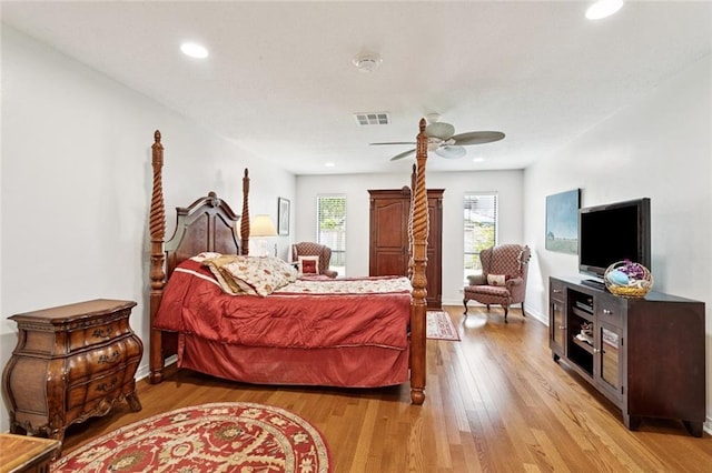 285 Oak Dr, Mandeville, LA 70471 - bedroom with light wood finished floors, recessed lighting, and a ceiling fan