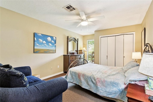 285 Oak Dr, Mandeville, LA 70471 - bedroom featuring carpet flooring, a closet, and a ceiling fan