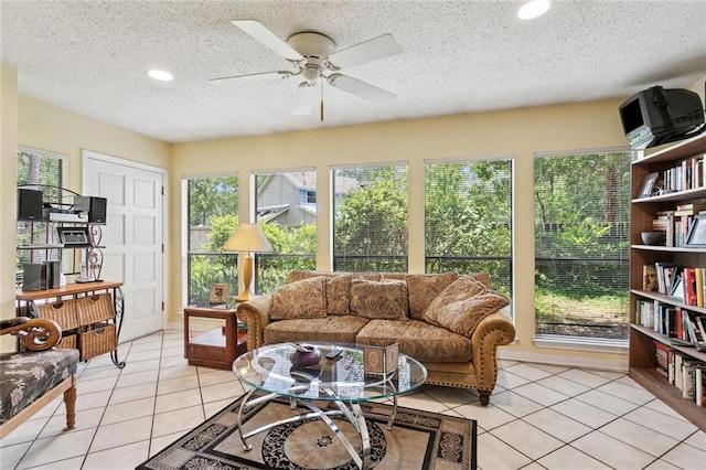 285 Oak Dr, Mandeville, LA 70471 - living area with a ceiling fan, light tile patterned floors, recessed lighting, and a textured ceiling