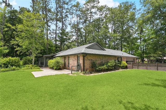 285 Oak Dr, Mandeville, LA 70471 - rear view of property with a patio and brick siding