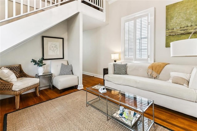 917 Joliet St, New Orleans, LA 70118 - living area featuring wood finished floors and healthy amount of natural light