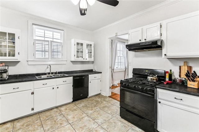 917 Joliet St, New Orleans, LA 70118 - kitchen with black appliances, under cabinet range hood, a ceiling fan, light tile patterned floors, and white cabinetry