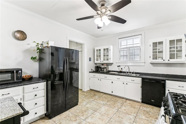 917 Joliet St, New Orleans, LA 70118 - kitchen with black appliances, crown molding, a ceiling fan, light tile patterned floors, and white cabinets