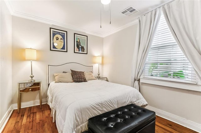 917 Joliet St, New Orleans, LA 70118 - bedroom featuring ornamental molding and wood finished floors