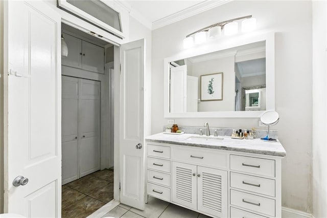 917 Joliet St, New Orleans, LA 70118 - bathroom with ornamental molding, vanity, and tile patterned floors