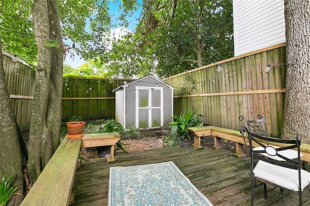 917 Joliet St, New Orleans, LA 70118 - wooden deck featuring a shed and a fenced backyard