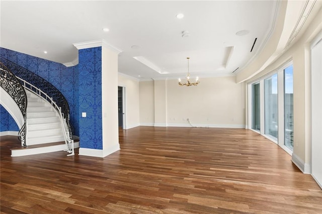 625 St Charles Ave Phd, Phd, New Orleans, LA 70130 - unfurnished living room featuring wallpapered walls, a chandelier, ornamental molding, wood finished floors, and recessed lighting