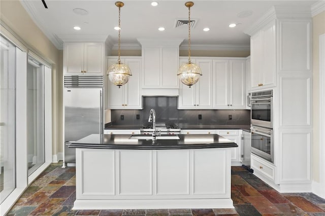 625 St Charles Ave Phd, Phd, New Orleans, LA 70130 - kitchen with appliances with stainless steel finishes, dark countertops, stone tile floors, recessed lighting, and ornamental molding