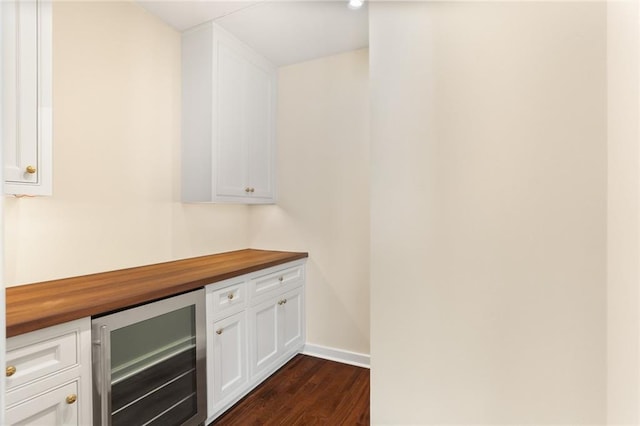 625 St Charles Ave Phd, Phd, New Orleans, LA 70130 - indoor dry bar featuring wine cooler and dark wood-style flooring