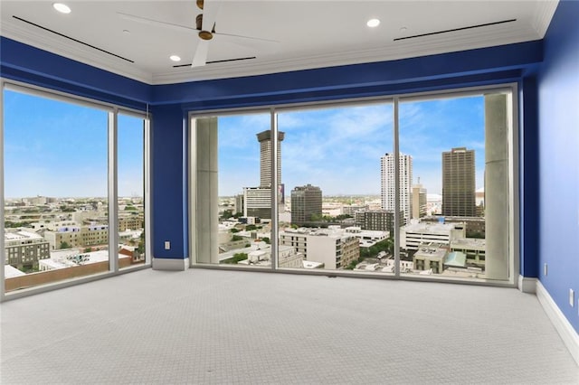 625 St Charles Ave Phd, Phd, New Orleans, LA 70130 - unfurnished room with carpet flooring, ornamental molding, a view of city, ceiling fan, and recessed lighting