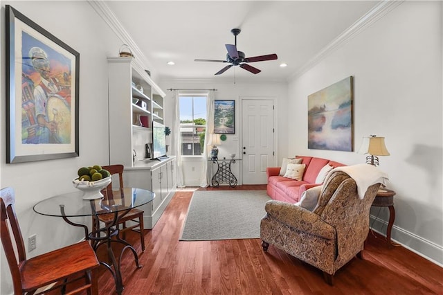 1210 Lyons St Unit 1210, New Orleans, LA 70115 - living area featuring crown molding, wood finished floors, a ceiling fan, and recessed lighting