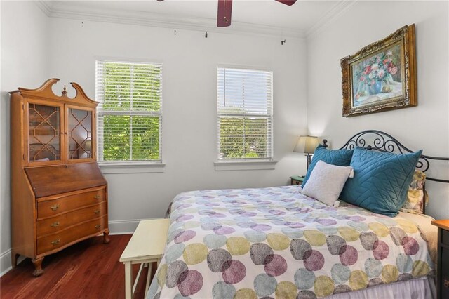 1210 Lyons St Unit 1210, New Orleans, LA 70115 - bedroom featuring dark wood-type flooring, crown molding, and a ceiling fan