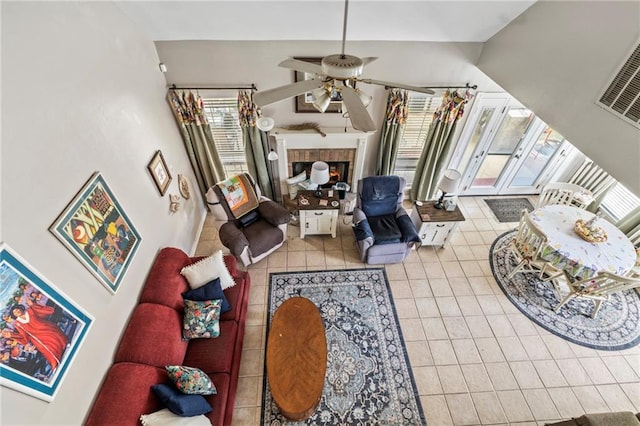 19199 Hector St, Mandeville, LA 70471 - living room with ceiling fan, healthy amount of natural light, and tile patterned flooring