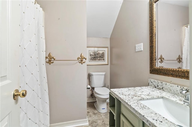 19199 Hector St, Mandeville, LA 70471 - full bathroom featuring vanity, lofted ceiling, and a shower with shower curtain