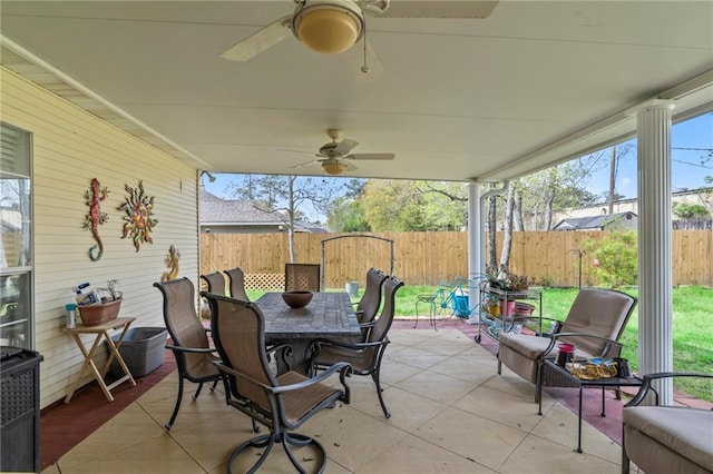 19199 Hector St, Mandeville, LA 70471 - fenced backyard with ceiling fan, outdoor dining area, and a patio area