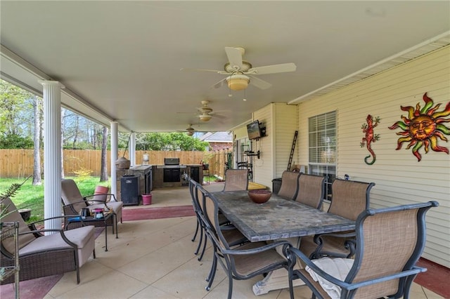 19199 Hector St, Mandeville, LA 70471 - fenced backyard with outdoor dining area, a patio, and ceiling fan