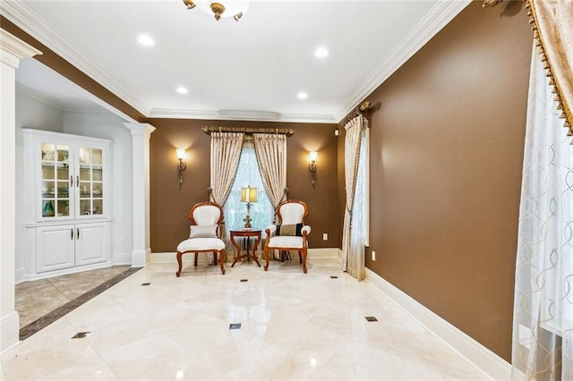 4917 Lake Vista Dr, Metairie, LA 70006 - living area featuring ornate columns, ornamental molding, and recessed lighting